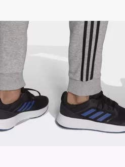 Adidas Essentials Fleece Tapered Cuff 3-Streifen Hose 7 Adidas Essentials Fleece Tapered Cuff 3-Streifen Hose -Familien Mode Verkauf 8012 GK8824 P2